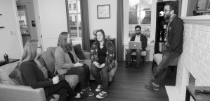 black and white image of employees socializing
