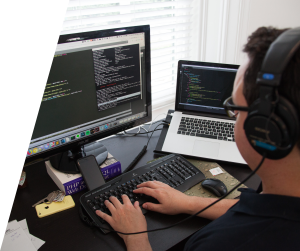 Developer working on code at computer