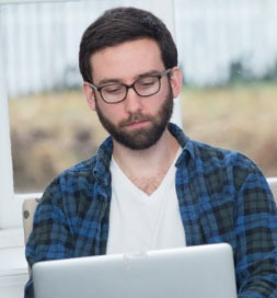 man working on a latpop