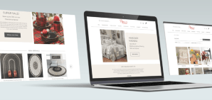 laptop with website homepage showing