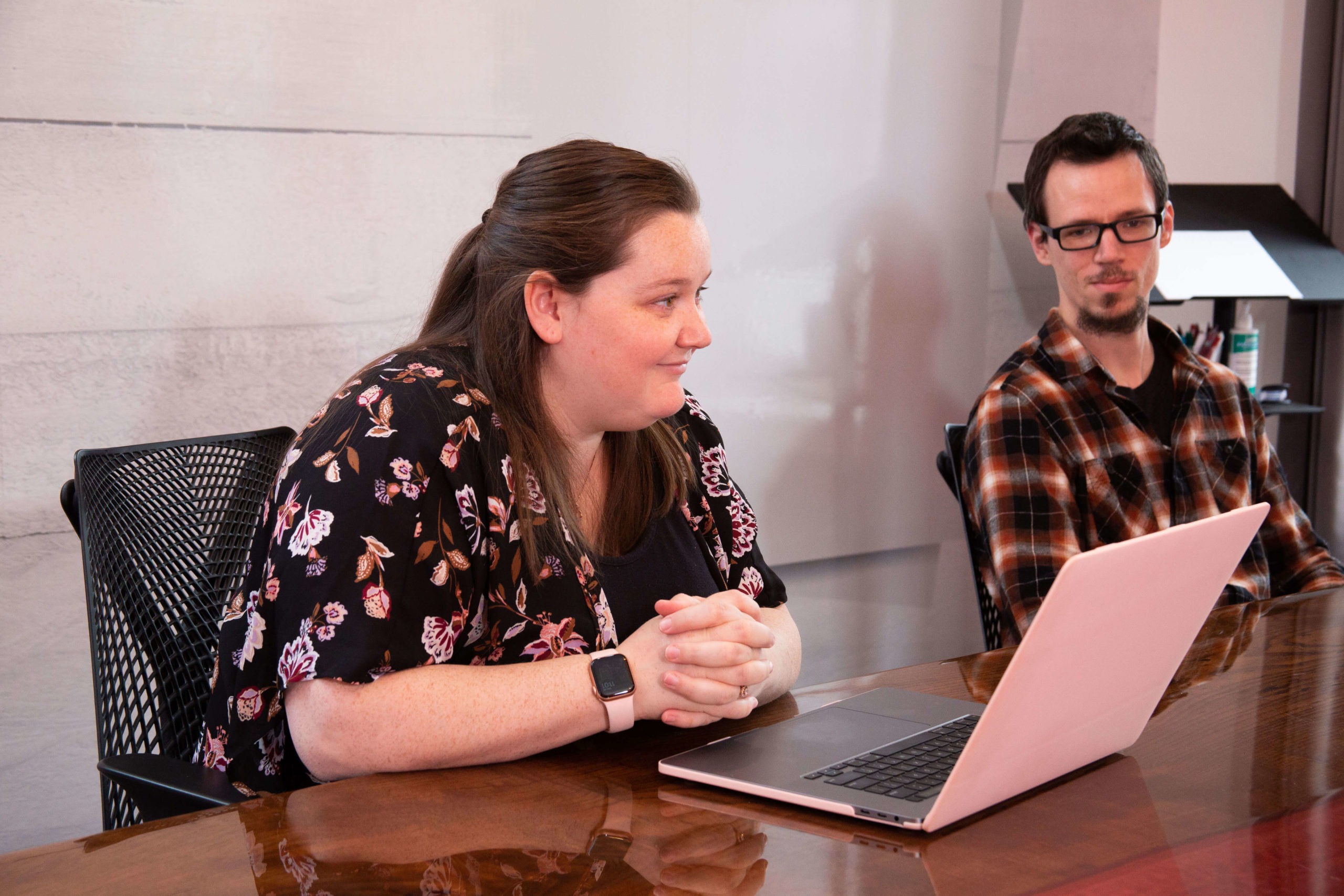 woman and man at a conference table