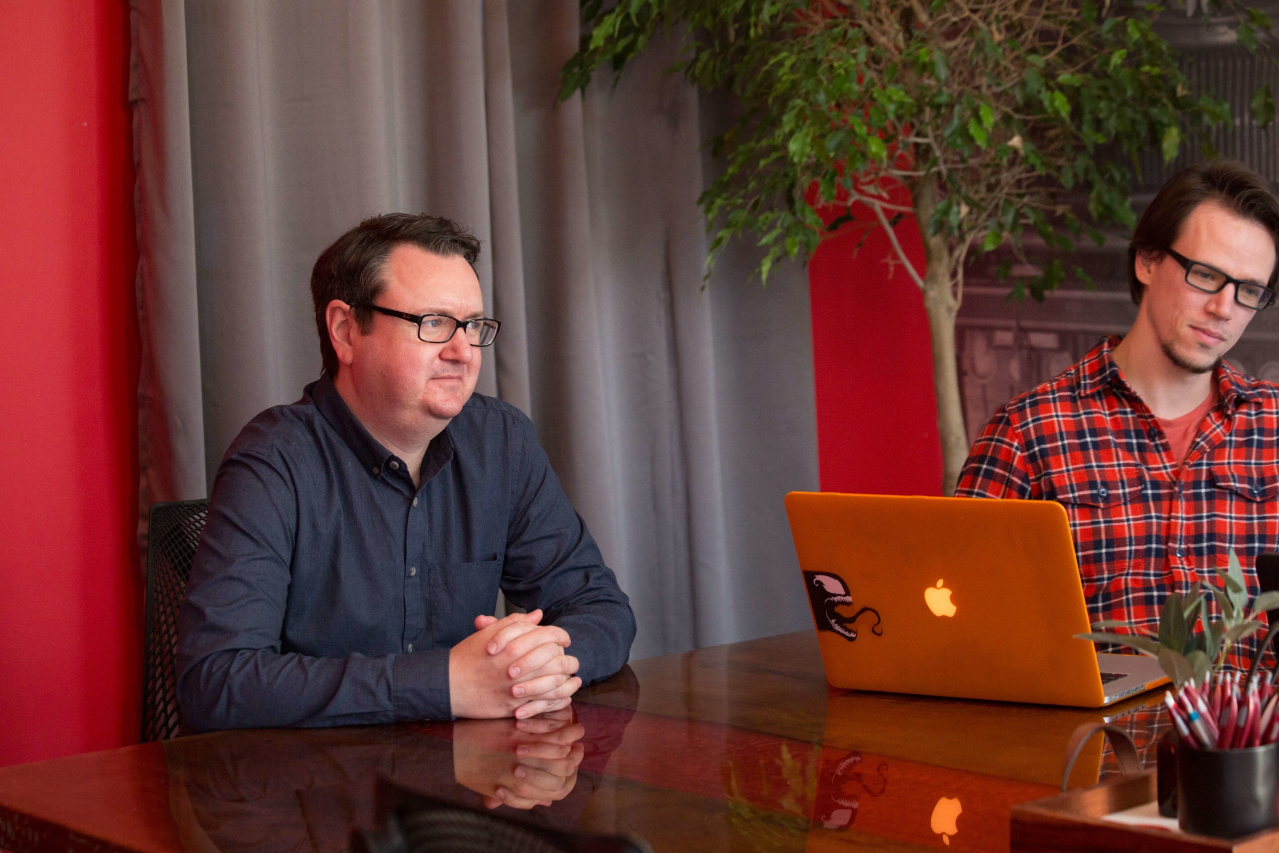 two men at a conference table