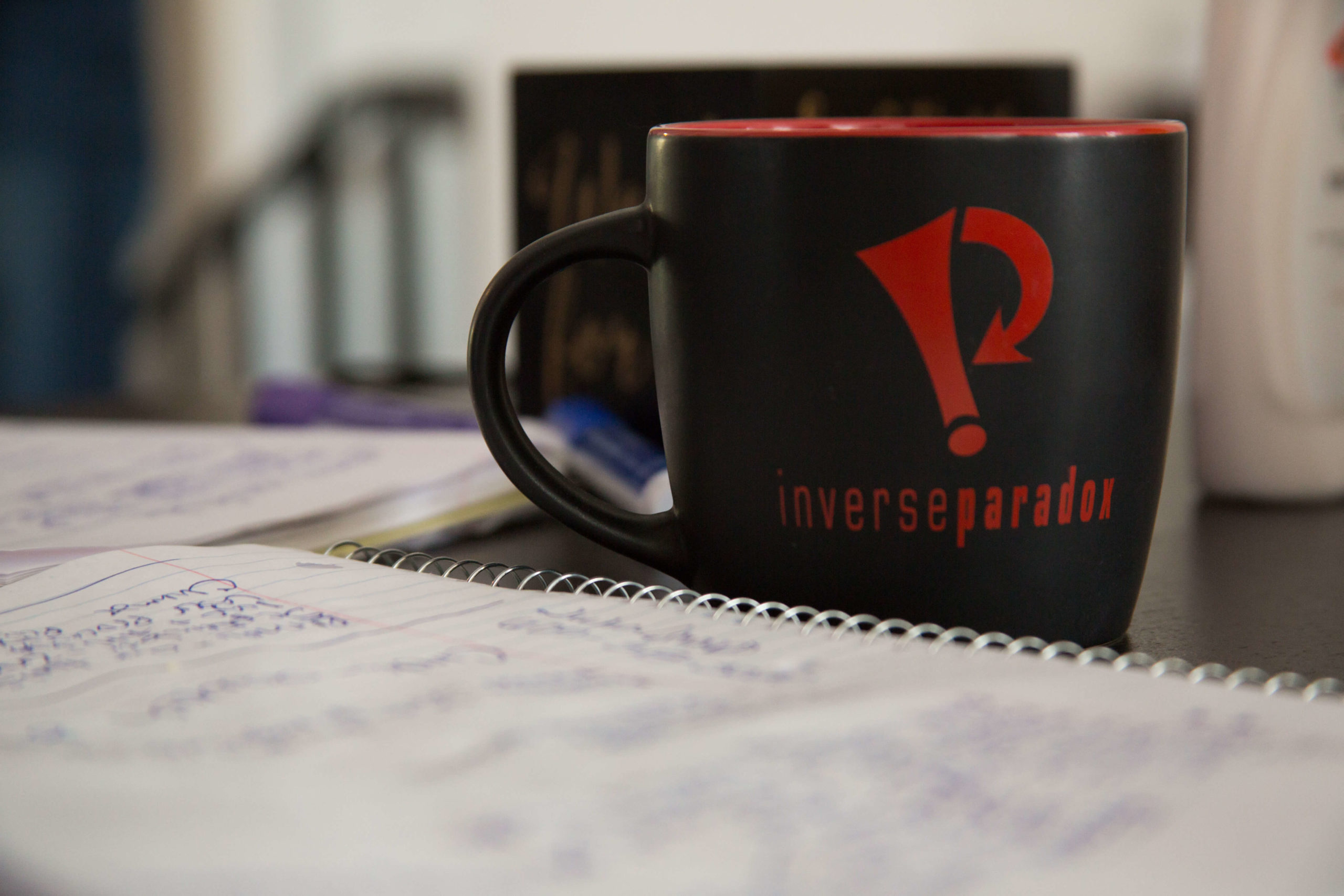 close up of coffee mug and notepad