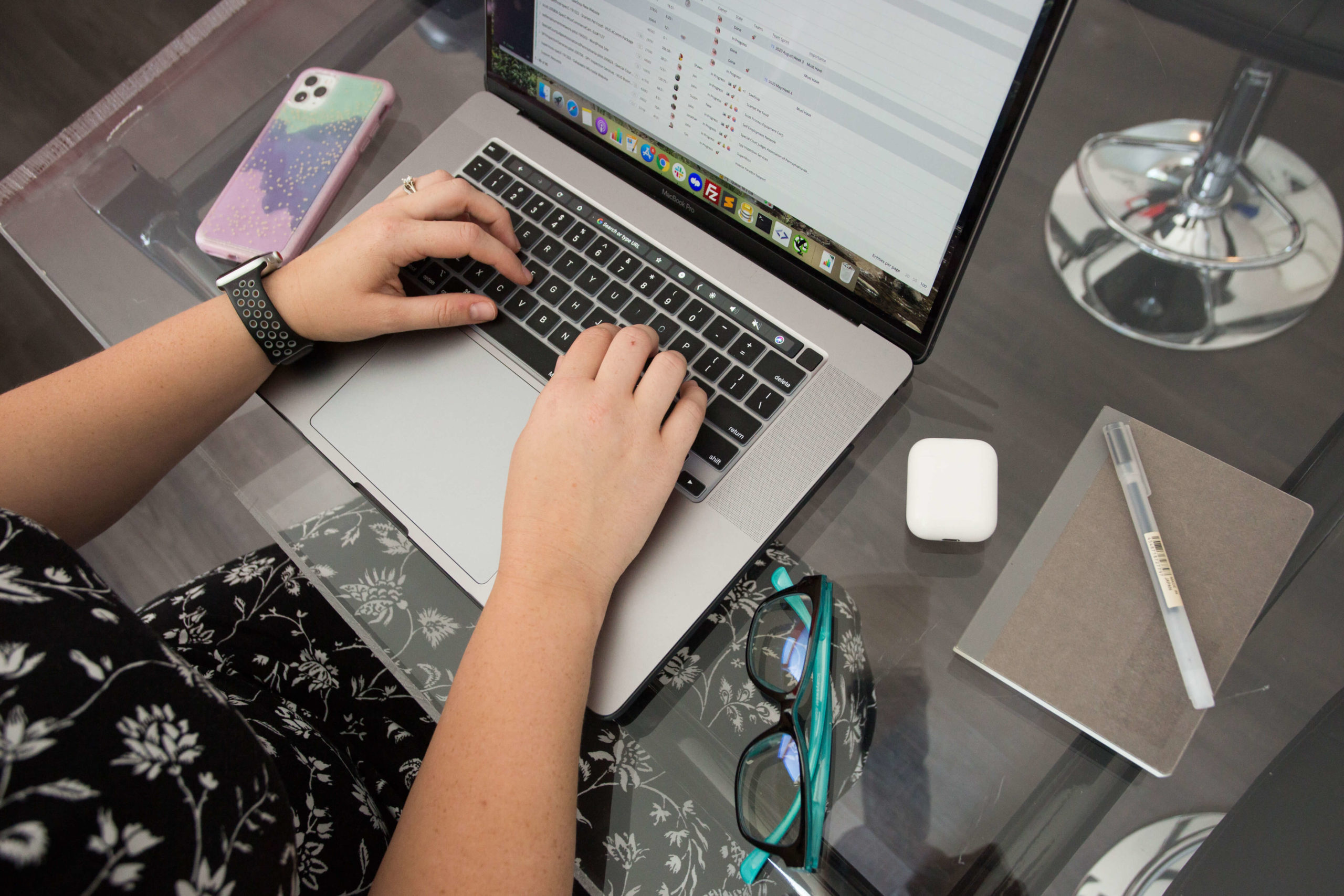 close up of hands on a laptop