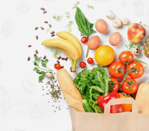 Food spilling out of a paper shopping bag