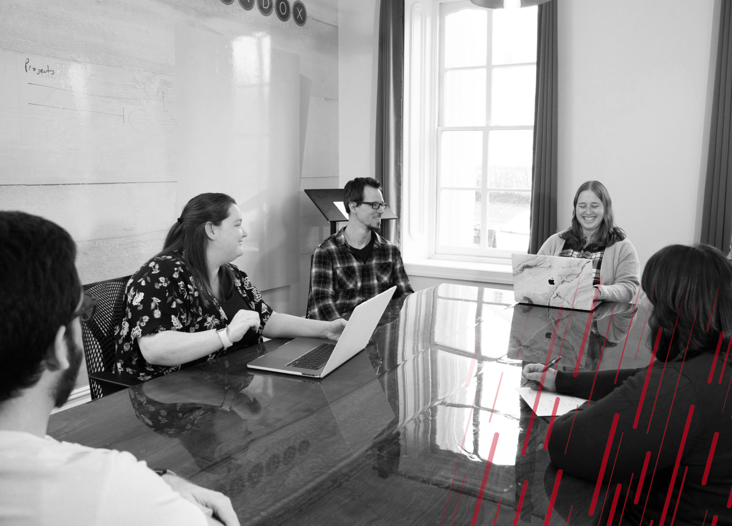 employees sitting around a conference table