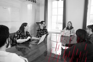employees sitting around a conference table
