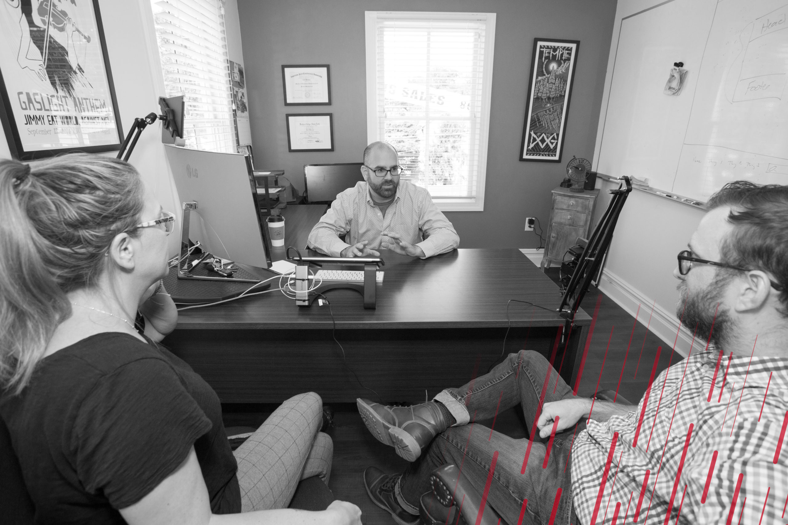boss meeting with two employees