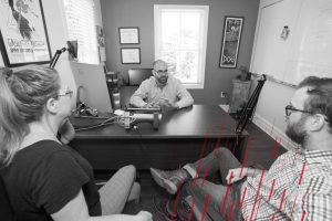 boss meeting with two employees