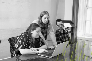 Sarah, Katie and Shawn in a meeting