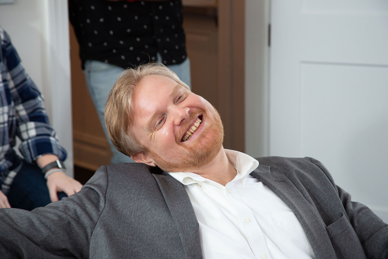 Alex smiling in office